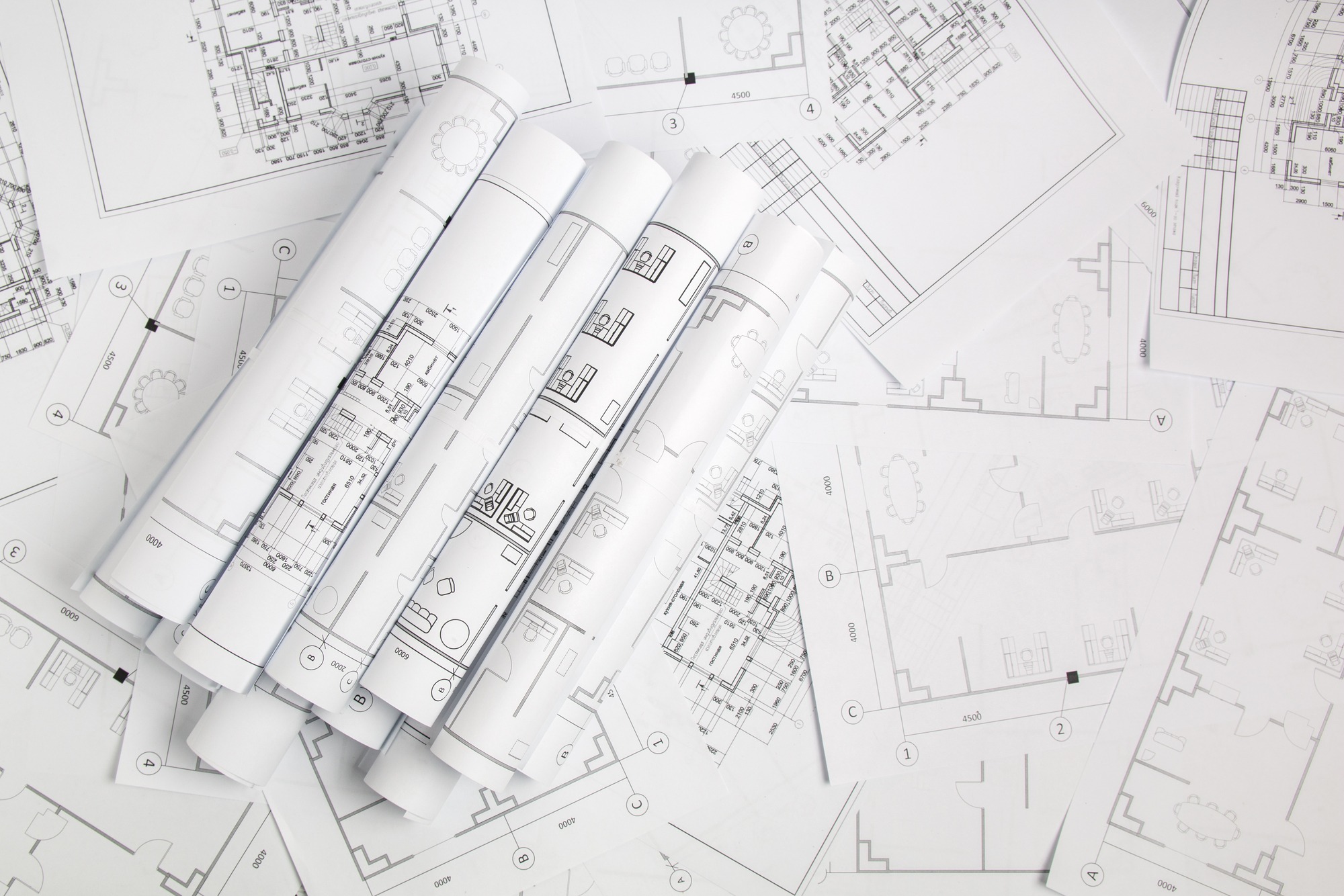 Paper architectural drawings and blueprint